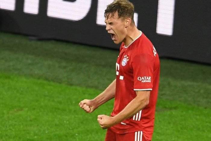 Joshua Kimmich celebrates scoring the winning goal for Bayern Munich
