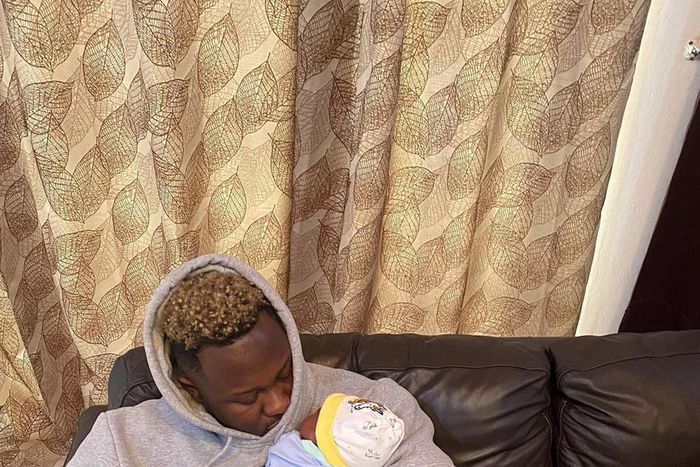 Medikal with his baby girl