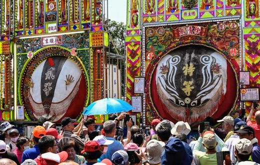 Festival goers looking at exhibits at Yimin temple in Hsinchu, northern Taiwan