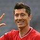 Robert Lewandowski celebrates his hat-trick for Bayern Munich on Saturday