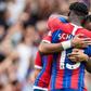 Jeffrey Schlupp embraces Jordan Ayew after the goal