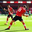 Southampton goal-scorer James Ward-Prowse (C) celebrates with Danny Ings (L)