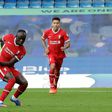 Senegalese Sadio Mane (L) scores his second goal for Liverpool in a 2-0 English Premier League win at Chelsea.
