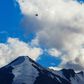 An Indian fighter jet flies over a mountain range in Leh, the joint capital of the union territory of Ladakh