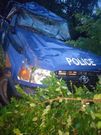 Mangled police vehicle after accident