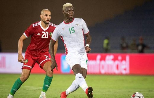 Bance (R) playing for Burkina Faso in an international friendly against Morocco last year