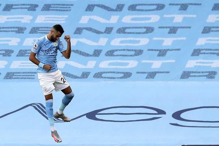 Algerian Riyad Mahrez celebrates putting Manchester City ahead, but his joy was shortlived as Leicester City hit back to triumph 5-2.