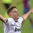 Manu Vallejo celebrates after scoring his second in Valencia's 4-2 win over Levante on Sunday.