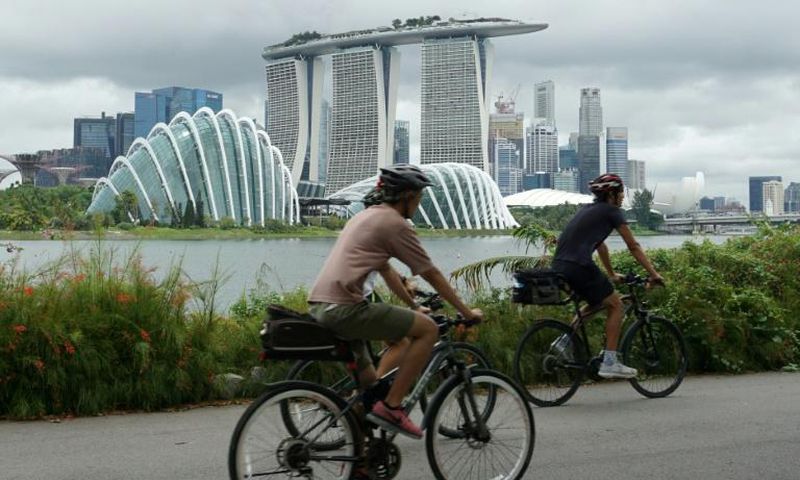 Singapore (pictured) and Hong Kong have long been compared
