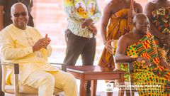 President John Dramani Mahama and Otumfuo Osei Tutu II exchanging pleasantries