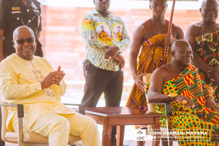 President John Dramani Mahama and Otumfuo Osei Tutu II exchanging pleasantries