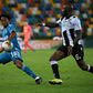 Juventus midfielder Juan Cuadrado (L) vies for the ball with Udinese's Ivorian midfielder Seko Fofana.