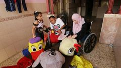 Nihad and his wife Zeinab generate a modest income by selling the dolls and by sending costumed performers to nurseries and schools