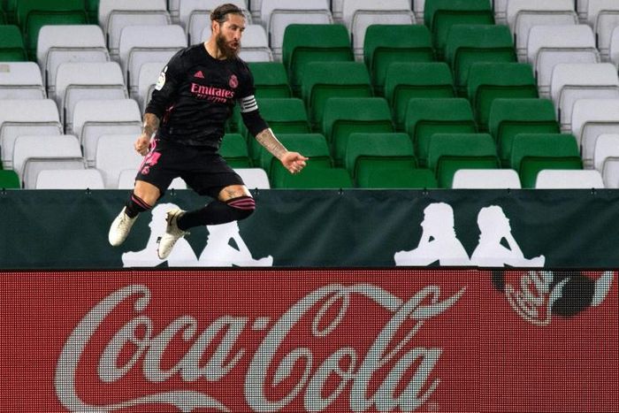 Real Madrid's Sergio Ramos celebrates scoring the winner against Real Betis in La Liga on Saturday.