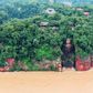 State media footage showed murky floodwaters lapping at the feet of the 71m metre-tall Leshan Giant Buddha in Sichuan - for the first time since the People's Republic of China was founded in 1949