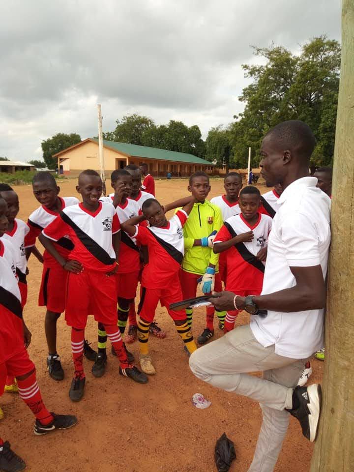 Coach Kabiru Abubakar with some players of Bawku Unity Stars at training