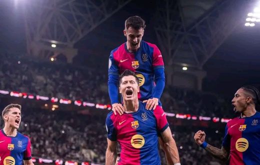 Barcelona players celebrating their goal against Real Madrid in Spanish Super Cup final