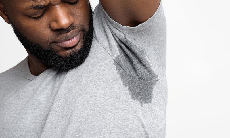 Person having excessive underarm sweating