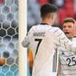 Kai Havertz (L) and Thomas Mueller (R) celebrate Germany's opening goal against Portugal