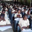 Students writing BECE