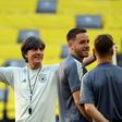 Germany coach Joachim Loew (C) oversees training on Monday in Munich