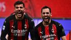 AC Milan's French defender Theo Hernandez (left) and Turkish midfielder Hakan Calhanoglu (right) have both tested positive for Covid-19