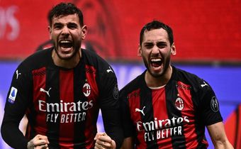 AC Milan's French defender Theo Hernandez (left) and Turkish midfielder Hakan Calhanoglu (right) have both tested positive for Covid-19