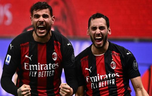 AC Milan's French defender Theo Hernandez (left) and Turkish midfielder Hakan Calhanoglu (right) have both tested positive for Covid-19