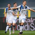 Atalanta's Mario Pasalic (R) celebrates his goal against Genoa.