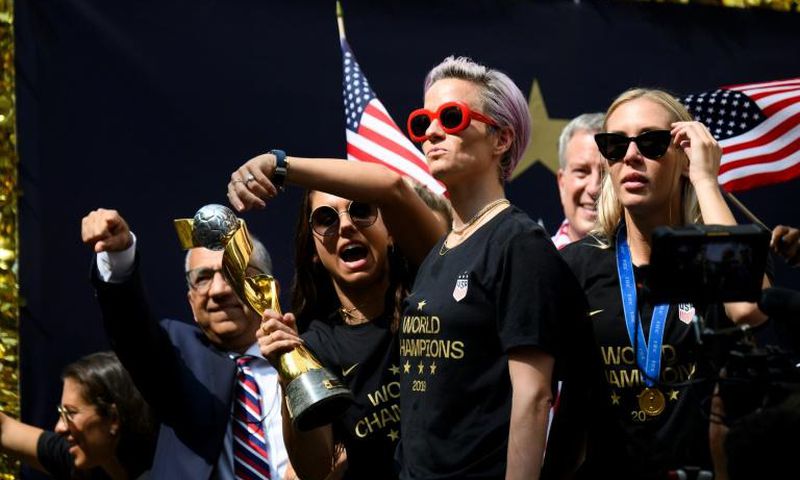 Members of the US women's soccer team celebrate their 2019 World Cup victory