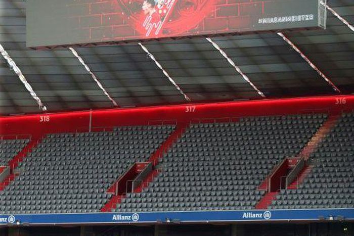 A board displaying the number nine is seen at the empty Allianz Arena after Bayern Munich were confirmed champions