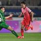 Chasing shadows: Kim Young-gwon, one of South Korea's scorers, skips past Annadurdyyev Altymyrat of Turkmenistan