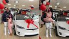 Lady shows off GHC450k Tesla car present on Val’s Day