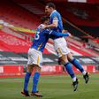 Brighton defender Lewis Dunk (right) celebrates scoring against Southampton