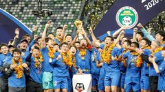 Jiangsu Suning celebrate winning the 2020 Chinese Super League after defeating Guangzhou Evergrande. China will attempt to move on from the collapse of the champions when the new season kicks off on Tuesday