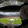 A spectator watches a match at the Ahmad bin Ali stadium in Qatar which will host Club World Cup fixtures
