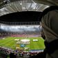 A spectator watches a match at the Ahmad bin Ali stadium in Qatar which will host Club World Cup fixtures