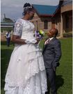 I love him the way he is – Tall bride tells critics who say groom is too short