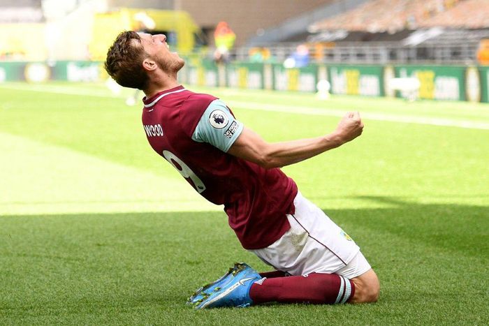 Burnley forward Chris Wood celebrates scoring a hat-trick against Wolves in the Premier League