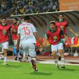 Soufiane Bouftini (C) celebrates scoring the first goal for Morocco in a 4-0 African Nations Championship sem-final victory over hosts Cameroon.