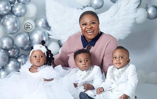 Rev Obfour's wife with her triplets