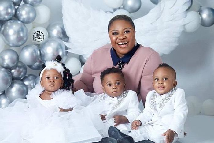 Rev Obfour's wife with her triplets