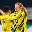 Striker Erling Braut Haaland (R) and England winger Jadon Sancho both scored in Dortmund's derby win on Saturday