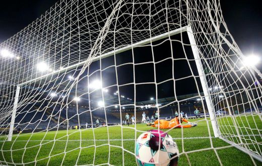 Fabian Klos scores the goal for Bielefeld on Tuesday which confirmed Schalke's relegation from the Bundesliga