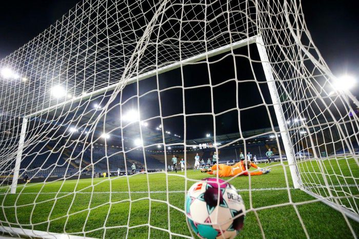 Fabian Klos scores the goal for Bielefeld on Tuesday which confirmed Schalke's relegation from the Bundesliga