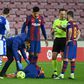 Down but not out: Lionel Messi lays on the ground after a foul