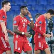 Bayern Munich's England Under-21 midfielder Jamal Musiala (R) celebrates scoring his first Champions League goal
