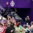 Flying high: Atletico Madrid players toss coach Diego Simeone to celebrate their Liga title