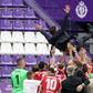 Flying high: Atletico Madrid players toss coach Diego Simeone to celebrate their Liga title