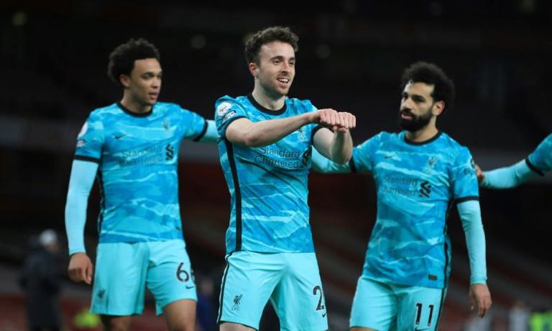 Super sub: Diogo Jota (centre) scored twice in a 3-0 win over Arsenal on Saturday